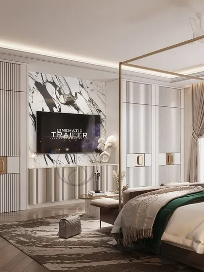 The view towards the TV and wardrobe wall in the Camellias master bedroom. We designed custom fluted wardrobes and a TV unit with a marble backdrop to create a seamless and elegant look.