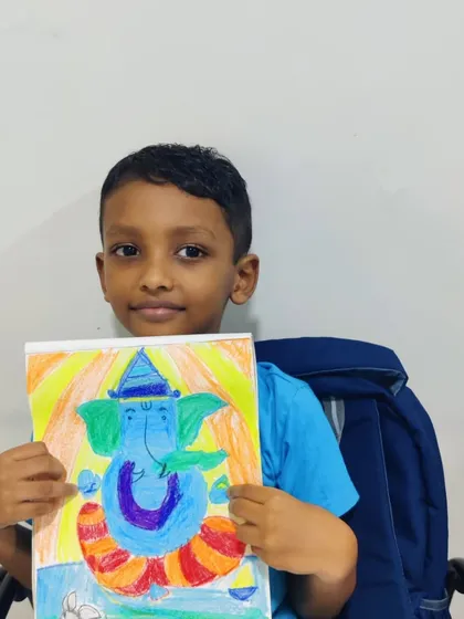 This student chose a vibrant blue for his Ganesha, setting it against a warm, sunny background. It’s a wonderful example of how children use colour to express feeling and personality in their art.