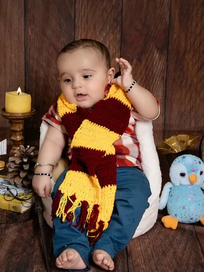 The prettiest wizard in town. These milestone sessions are so much fun, allowing your baby's budding personality to shine through in a creative and playful setting.