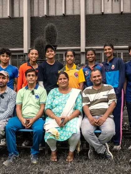 Behind every player is a family. This photo captures our players with their parents, who are an essential part of our academy's community. Their unwavering support is a cornerstone of our success.
