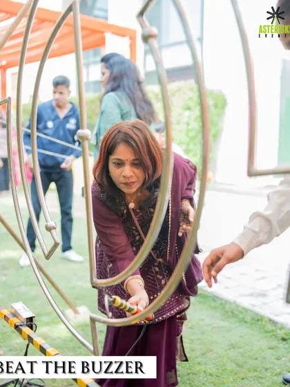 The "Beat the Buzzer" game, a classic that brings out the competitive spirit and laughter in guests.