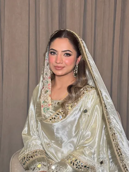 Maanvi, looking absolutely angelic for her Roka ceremony. The makeup is soft, dewy, and enhances her natural glow.