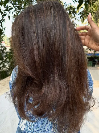 This 'Warm Caramel' look is a perfect example of a beautiful grey coverage transformation. I blended the greys seamlessly into a warm, multi-tonal brunette that looks completely natural.