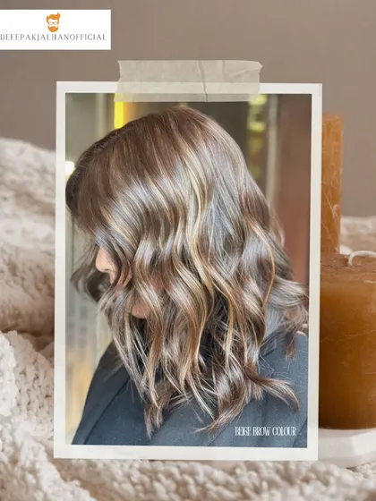 A dreamy beige brown balayage that provides a natural glow. This low-maintenance color is perfect for adding warmth and dimension.
