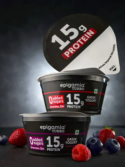 An experimental shot for Epigamia's Turbo yogurt, using a low angle and stacked composition. This approach creates a heroic and bold look for the product, emphasizing the "15g Protein" callout on the packaging.