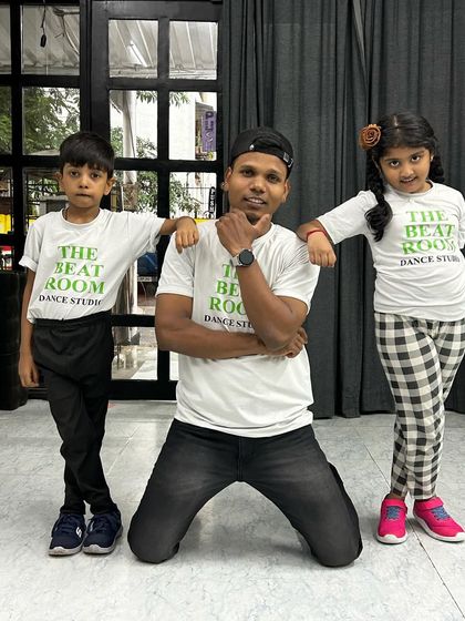 Posing with two of our bright young stars. It's so rewarding to see our students grow in confidence and skill every day.