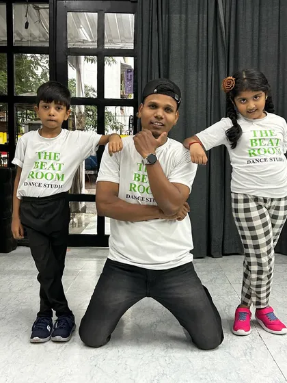 A proud moment with two of our dedicated young students. We focus on providing individual attention to help every child grow as a dancer.