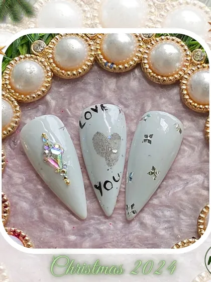 A sweet "Love You" themed set with delicate lettering and crystal work, demonstrating the fine motor skills our students develop.