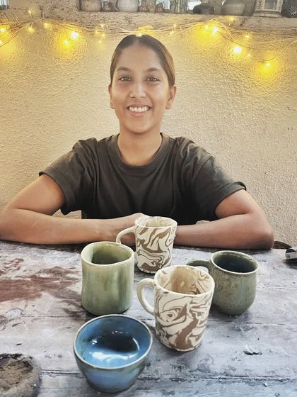 This student created a lovely, earthy collection of mugs and bowls during her beginner's course, experimenting with marbled clay and different glaze combinations.