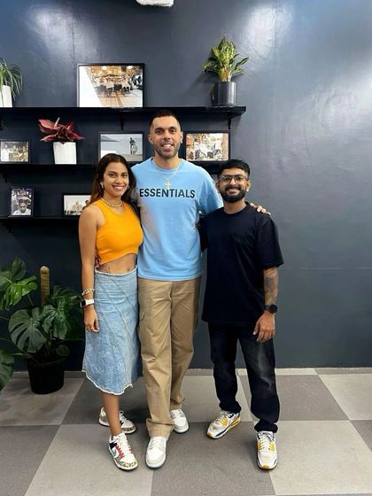 With my good friends, footballer Robin Singh and his wife Lianne. They have been huge supporters of my work from the very beginning. Building lasting relationships with my clients is just as important as the haircuts I give.