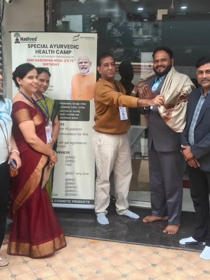 A gesture of respect and appreciation during the felicitation ceremony at our health camp. I am thankful for the support of the community and organizers.