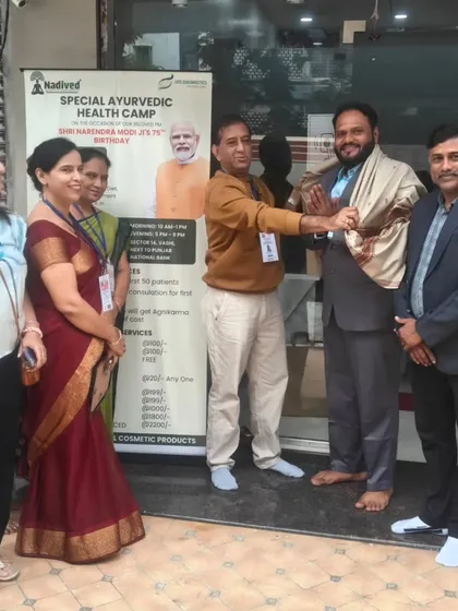 A gesture of honor and respect at our community health camp. My goal is to serve the community by spreading awareness about the benefits of a holistic, Ayurvedic lifestyle.
