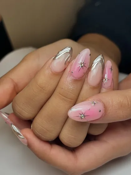 Another angle of the pink ombré and chrome nails, showing how the different elements catch the light.