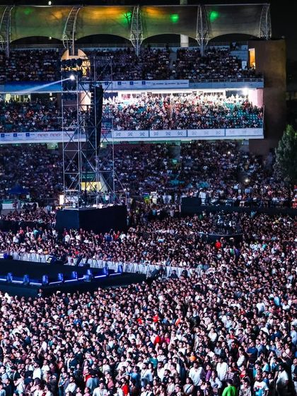 The view from the stands, capturing the full scope of our stadium production. We manage every element to create a cohesive and powerful live music event.