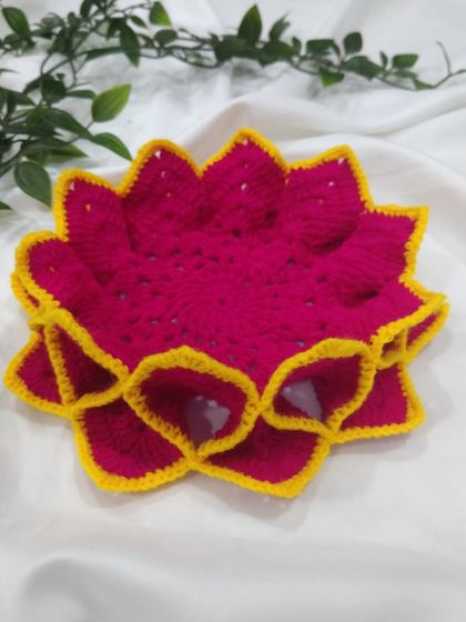 Another view of the pink and yellow lotus coaster, perfect for placing small idols or a diya.