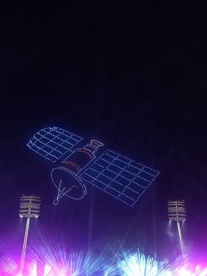 A satellite formation hovers in the sky during our show in Oman. This display highlights our ability to create complex technological and scientific imagery.