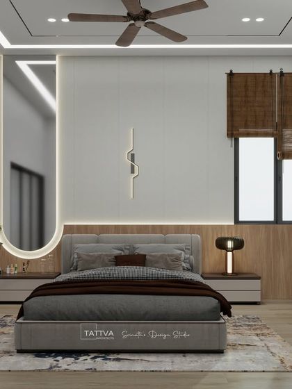 A modern bedroom design featuring an asymmetrical backlit mirror, wood paneling, and a calm, minimalist aesthetic.