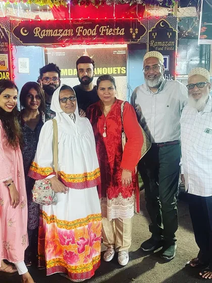 A family relishing food at our festival. We love to see these happy moments.