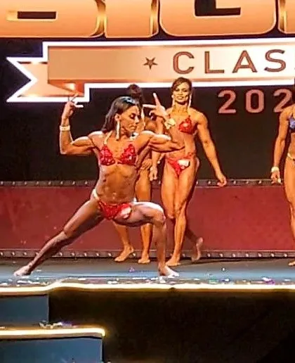 Stage presence is everything. I teach my clients how to command attention with powerful posing that highlights every muscle group you've worked so hard for.