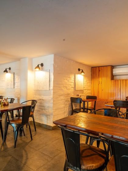 The downstairs seating area at our Vasant Vihar outlet, offering a cozy and intimate dining experience.