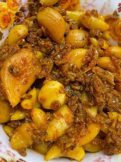 This is my Lehsun (Garlic) pickle, made with whole cloves of garlic. It's known for its strong, pungent flavour and is great for digestion.