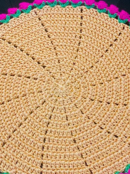 Another shot of the popular beige and pink tulip doily.