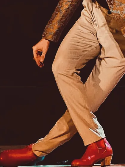 A close-up on my red Flamenco boots in motion during a performance.