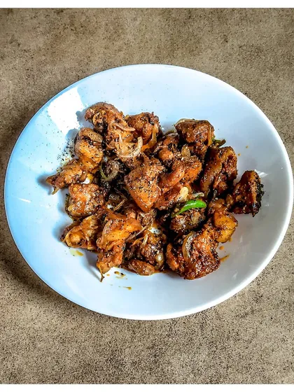 My Pork Pepper Fry is a simple yet flavourful dish. I stir-fry chunks of pork with a generous amount of black pepper and other spices for a quick and satisfying meat preparation.