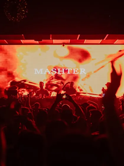 A close-up of the visuals, which were a key part of the show's impact. The abstract, fiery imagery perfectly complemented the driving techno beats.