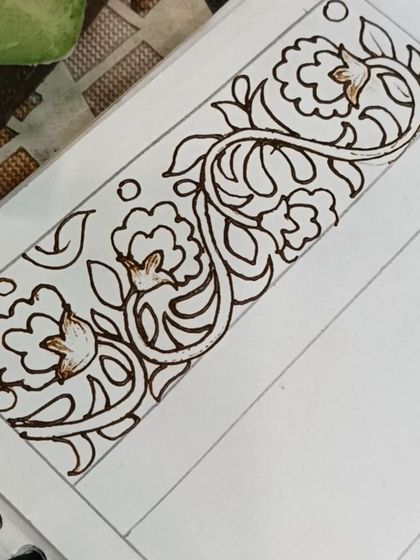 The same border design in its outline phase. This shows how we first draw the pattern and then fill the background.