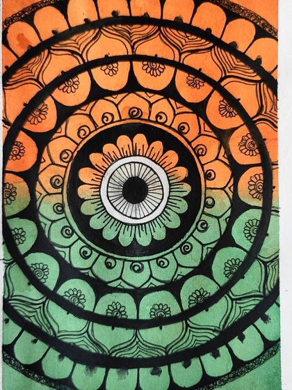 A finished mandala I created for Independence Day, using the colors of the Indian flag with a watercolor blend effect.