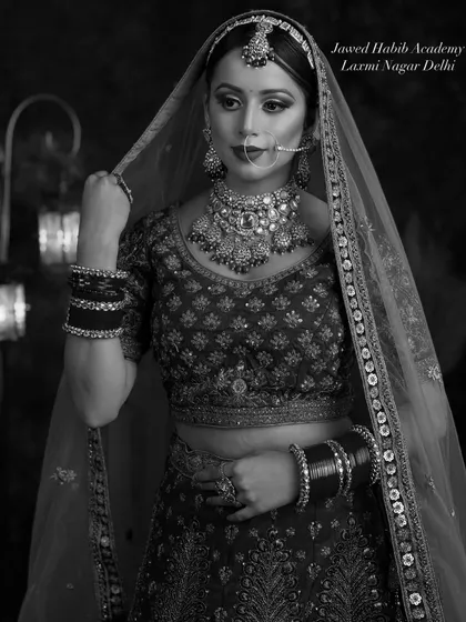 The same bridal look in a black and white photo, emphasizing the importance of contouring and structure. Our curriculum ensures makeup translates beautifully in all forms of photography.