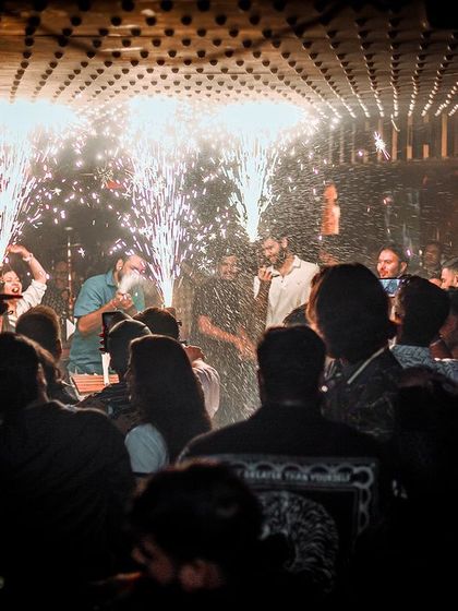 A birthday celebration with pyrotechnics in the middle of the dance floor at XS Superclub.