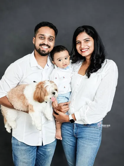 A classic studio family portrait that includes the family dog. This image shows that I welcome pets to be part of your family photoshoot, ensuring the whole family is included in the memories.