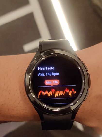 Monitoring my heart rate during a tough bench press session. Pushing the intensity while training smart.