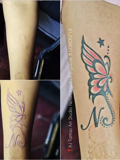 This client had a scar and some old ink. I designed a butterfly and initial tattoo to cover the area beautifully.