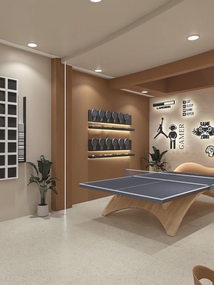 This is a game room we designed for a recreational space. It features a mix of activities like table tennis and a wall-mounted chess board, with fun, graphic wall art to create a playful and energetic atmosphere.