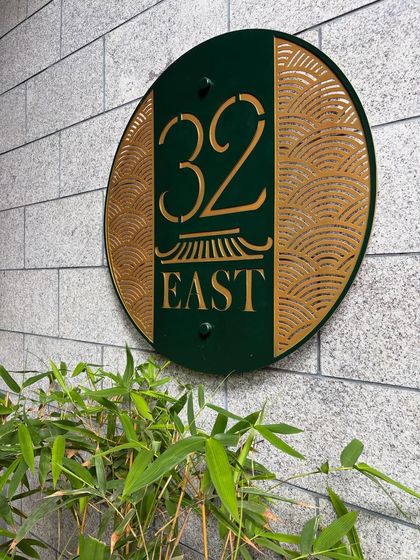 The elegant signage of 32 East. I focus on branding details like this to help build a restaurant's identity and make the content instantly recognizable.