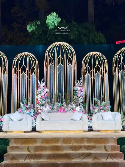 The full stage viewed from the grand staircase, emphasizing the scale and symmetry of this incredibly detailed and luxurious wedding decor.