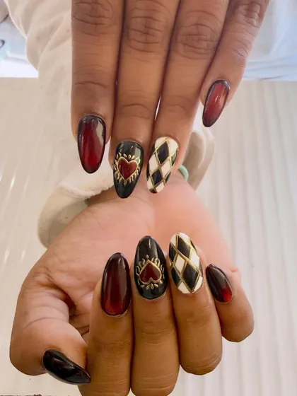 Bring your boldest ideas, and I'll bring them to life. This set is inspired by a Queen of Hearts theme, with detailed, hand-painted checkerboard patterns and heart motifs on almond-shaped extensions.