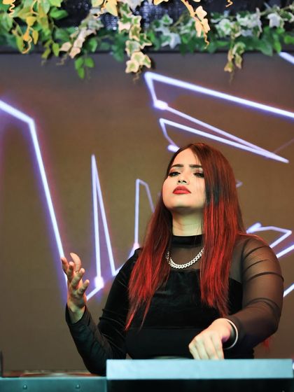 A portrait from one of my club gigs, showcasing the professional and high energy persona I bring to every event.