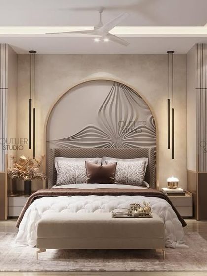 A touch of tranquility. This bedroom features a beautiful arched headboard with 3D relief art, flanked by minimalist wardrobes. The neutral color palette creates a calm and soothing atmosphere.