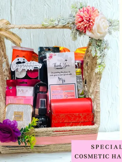 A special cosmetic hamper designed to delight. This basket includes a mix of makeup and skincare items, along with a "Congratulations" and "Thank You" card.