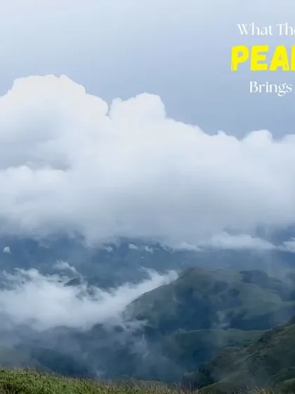 A beautiful shot of the misty peaks of Kudremukha, captioned "What The PEAK Brings".
