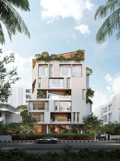 This is a vision for a mid-rise coastal residence in Mumbai. The design is a carved volume with integrated planters and framed openings, creating a dialogue with the sea while modulating privacy, light, and ventilation for urban living.