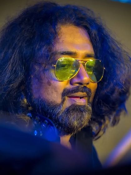 Our drummer, looking cool and confident behind his kit at the Bangalore Club.