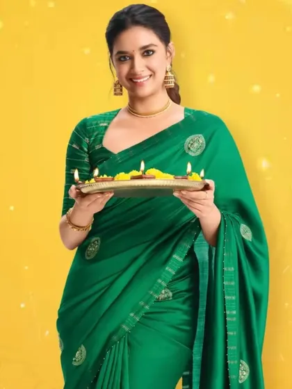 It was an absolute joy draping the gorgeous Keerthy Suresh for this festive shoot. I ensured the green silk saree had a flawless fall, complementing her grace and creating a vibrant, celebratory look for the camera.