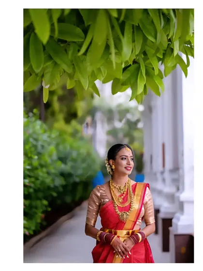 A portrait of timeless elegance. We focus on capturing the grace and beauty of the bride in her traditional attire. Using soft, natural light, we highlight the intricate details of the jewellery and the serene expression of the bride on her special day.