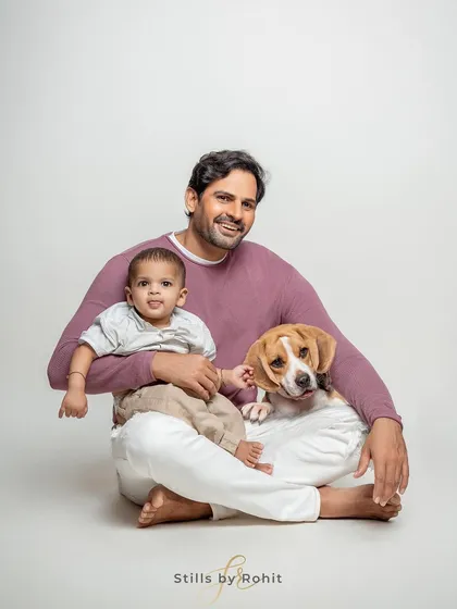 In the studio, my goal is to keep it simple so your family's connection shines through. This portrait of a new dad, his baby, and their ever-loyal beagle is a perfect example of the timeless, clean, and heartfelt images we can create together.