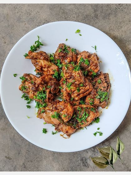 A clean plating of my Karnivore Chicken Fry, garnished with fresh parsley.